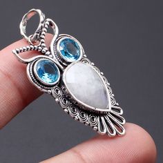 Rainbow Moonstone, Blue Quartz Pendant 925 Sterling Silver Pendant, Rainbow Moonstone, Blue Quartz Gemstone jewelry Handmade jewelry  AA 73 PRODUCT: You will receive the EXACT item as pictured CONDITION: New COLOR: As pictured SHAPE: As shown Thank You So Much For Visiting Our Shop We Hope You Enjoy Shopping With Us Spiritual Round Blue Topaz Jewelry, Sapphire Gemstones With Sterling Silver, Sterling Silver Sapphire Gemstones, Sterling Silver Sapphire Gemstones With Accents, Spiritual Blue Topaz Jewelry In Blue, Moon Shaped Natural Stones Jewelry For Anniversary, Spiritual Blue Topaz Jewelry As A Gift, Spiritual Silver Jewelry With Blue Topaz, Handmade Moonstone Fine Jewelry