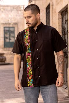 This beautiful Traditional Guayabera for Men is embroidered and adds a sophisticated flare to your wardrobe.  This elegant button up Shirt is perfect for special occasions such as Mexican Fiestas, Quinceañeras, Weddings, etc. This guayabera is handmade and completely hand embroidered by Mexican Artisans in Oaxaca, Mexico. The shirt is sent in either a Sport or Band collar, it depends on the one we have available. More styles available here: https://www.etsy.com/es/shop/SoleiEthnic?ref=seller-pla Traditional Black Shirt With Floral Embroidery, Traditional Short Sleeve Shirt With Multicolor Embroidery, Traditional Fit Short Sleeve Shirt, Men Formal, Mens Oxfords, Style Shirt, Button Up Shirt, Traditional Style, Hand Embroidered