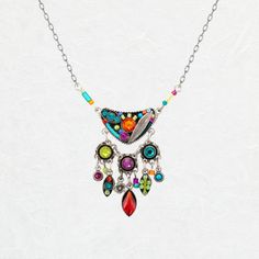 We might go as far to say that this necklace gives a garden full of blooming flowers a run for their money. The Firefly Botanical Bryn Necklace is simply bursting with color! You heard it here. We are still trying to catch our breath since we first laid eyes on this necklace and adds a dash of dazzle to your ensemble. We are certain that you will be reaching for the Firefly Botanical Bryn Necklace time and time again. Retired Multi-color European crystals, Czech glass Chain approximately 18 inch Artistic Multicolor Round Pendant Necklace, Fusion Style Multi-stone Necklaces, Fusion Style Multi-stone Necklace, One-of-a-kind Multicolor Long Necklace, Spiritual Multicolor Round Pendant Necklace, Spiritual Multicolor Sterling Silver Necklace, Multicolor Necklaces With Detachable Pendant, Artisan Multicolor Round Pendant Necklace, Multicolor Artistic Pendant Jewelry