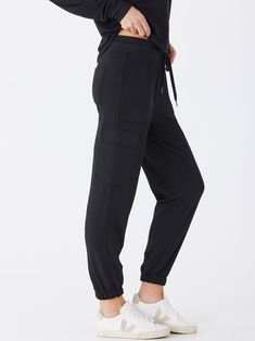 Indulge in ultimate comfort with Margot Modal Terry Cargo Jogger. Featuring a soft, wide elastic waistband for all-day comfort, and convenient cargo pockets for added functionality. Elevate your loungewear game with these joggers and experience a new level of relaxation. Comfort Stretch Joggers With Pockets For Gym, Activewear With Pockets For Jogging, Comfort Stretch Gym Joggers With Pockets, Sporty Joggers With Functional Drawstring, Gym Joggers With Comfort Stretch And Pockets, Jogging Activewear With Pockets, Athleisure Joggers With Functional Drawstring, Athleisure Cargo Pants With Side Pockets For Sports, Athleisure Cargo Pants With Side Pockets For Gym