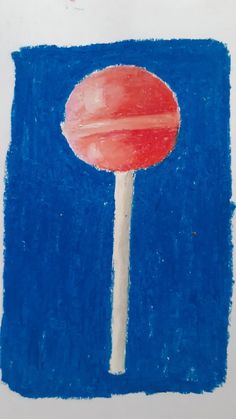 a drawing of a red lollipop on a blue background