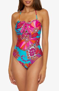 Matching fabric ties cross at the front of this vacation-ready one-piece swimsuit finished with a removable halter strap. Ties at front Removable, adjustable halter strap Moderate back coverage Lined 83% nylon, 17% spandex Hand wash, line dry Imported Bandeau One Piece Swimsuit, Floral One Piece Swimsuit, 60s Fashion, Neck Lace, Sweetheart Neck, Trina Turk, Fall Collections, One Piece Swimsuit, Fitness Models