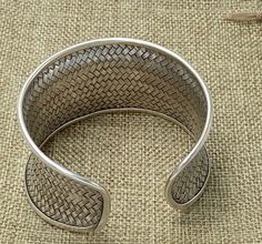 "Braided Sterling Silver Statement Boho Cuff Bracelet, Handmade Wide Woven white Silver Ethnic Bangle, Tribal Weave Adjustable Cuff Width: Front side 1 9/16 inches (1.6\") / 4cm Longer versions (2.75\" and 4.3\"): https://www.etsy.com/listing/603575462 https://www.etsy.com/listing/569455658 Metal Purity: 95% Silver (Purer than 925 Sterling Silver) We also have designs version of Braided cuff : https://www.etsy.com/listing/253985429/wide-woven-silver-cuff-bracelet-extra?ref=shop_home_active_24 An Adjustable Cuff Bangle In Traditional Style, Adjustable Woven Cuff Bracelet, Traditional Adjustable Cuff Bangle, Adjustable Handwoven Traditional Cuff Bracelet, Traditional Woven Bangle Bracelet, Traditional Handwoven Adjustable Cuff Bracelet, Traditional Woven Bangle Jewelry, Traditional Woven Bracelet Jewelry, Traditional Woven Bangle