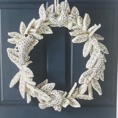 a close up of a door with a wreath on it