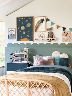 a child's bedroom decorated in pastel colors