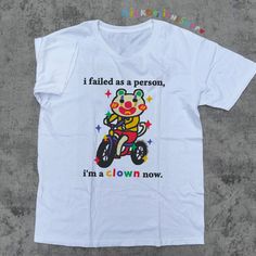 I Failed As A Person Tee that says I Failed As A Person Im A Clown Now is a funny meme shirt to wear in school, in your walks at the park, while lounging at home or anywhere you go for those days when you just feel like giving up as a human. Inspired by kidcore clothes and clowncore clothing - this clown shirt will surely make everyone laugh and make you relatable. This funny shirt can be a funny gift for her, funny gift for him or anyone in between as these funny statement shirt is unisex. Avai Kidcore Clothes, Kidcore Clothing, Clown Shirt, Y2k Shirts, Silly Clothes, Silly Shirt, Funny Gifts For Her, Funny Statements, I Failed