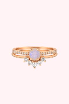 Searching for stacking rings? Discover our Rose Gold Rainbow Moonstone & Topaz Dancing Fairy Ring set at La Kaiser. Crafted with 14kt rose gold, natural white topaz, and vibrant rainbow moonstones, this 3-ring set is ideal for gemstone lover. Add a colorful touch to your everyday style with this unique jewelry piece. Shop now! Rose Gold Moonstone Ring With Rose Cut Diamonds, Dainty Rose Gold Moonstone Ring, Rose Gold Moonstone Ring With Gemstone, Stackable Round Moonstone Ring In Rose Gold, Stackable Rose Gold Moonstone Ring, Celestial Rose Gold Gemstone Rings, Celestial Rose Gold Crystal Promise Ring, Rose Gold Celestial Moonstone Ring For Anniversary, Celestial Rose Gold Moonstone Ring For Anniversary