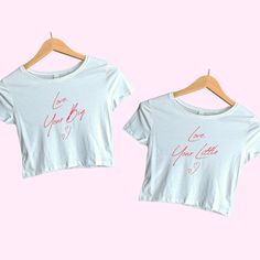 A love letter to your future little in T-shirt Form <3 -Sold separately -Baby tee comes in black or white -52% combed ring-spun cotton, 48% polyester  -Made to order (ships in 2-5 business days) -If EXPRESS shipping is requested, please include your phone number as a note in your order! Thank you!! :) Fitted Family Matching Tops With Name Print, Family Matching Fitted Graphic T-shirt, Fitted Crew Neck Top For Family Matching, Matching Crew Neck T-shirt With Text Print, Graphic Tee With Letter Print As Gift, Graphic Tee With Slogan As A Gift, Graphic Tee With Slogan As Gift, Crew Neck T-shirt With Text Print, Matching Short Sleeve Letter Print T-shirt