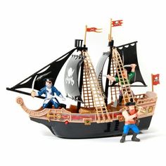 a toy pirate ship with two men on it