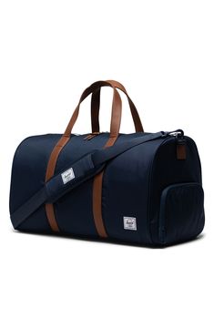 A U-shaped opening means convenient access to your essentials in this weekend-ready duffle bag featuring a side shoe compartment for easy storage. Lined   600-denier ripstop   100% recycled polyester   Imported Herschel Bag, Black Duffle Bag, Sac Week End, Enjoy The Ride, Travel Duffel, Duffel Bags, Herschel Supply Co, Herschel Supply, Herschel