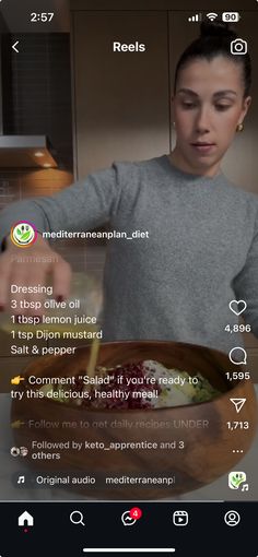 the woman is preparing her meal in the kitchen