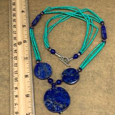 "32.6 grams, 2mm - 30mm, 21\" Multi-strands Beaded Lapis Lazuli Pendant Necklace ATS Statement, oval, round shape, Green Synthetic Turquoise. Ep157 Weight: About 32.6 Grams or so Lapis Beads: About 17mm-30mm Lapis Beads Thickness: About 4-5mm Nephrite Beads Size: 1mm x 2-3mm Length: About 21\" or so The exact item will be delivered. I list one by one. So, purchase with confidence. I do offer combined shipping." Artisan Blue Round Beads Gems And Cabochons, Artisan Blue Round Beads, Blue Round Bohemian Beads, Gems And Cabochons, Blue Bohemian Beads, Gems, And Cabochons, Blue Bohemian Round Beads Gems And Cabochons, Blue Oval Beads Gemstone Jewelry, Artisan Blue Round Beads Jewelry, Artisan Blue Beaded Jewelry, Artisan Blue Round Beaded Jewelry