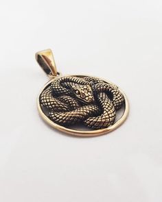 This item is made to order. Casting in any metal will take 14-19 days. Please, leave your orders.Astonishing snake pendant, unisex. Bronze or silver, with or without leather cord.Size - 1 inches / 2,6 cmWeight for bronze -  5,8 g.Weight for silver -  7,1 g.✤ If you have any questions - feel free to ask! Vampire Ring, Gothic Engagement Ring, Skull Engagement Ring, Necklace Snake, Wolf Necklace, Snake Pendant, Viking Necklace, Snake Jewelry, Snake Necklace