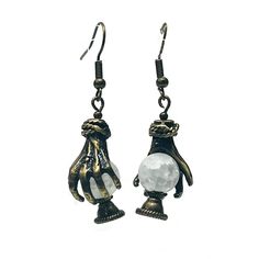 Fortune Teller Hand Frosted Cracked Glass Crystal Ball Dangle Hook Earrings Metal - Antique Bronze-tone Metal Alloy Earrings come with wire style hooks. FOR SHIPPING AND RETURN POLICY, JEWELRY CARE INSTRUCTIONS, WARNINGS, AND OTHER BORING STUFF, SEE BELOW: This jewelry is handmade. The color may vary slightly depending on your device and/or it may have minor imperfections. It is water resistant, but not waterproof. It is not recommended that you submerge it in water or expose it to extreme heat or cold. Some of the jewelry I offer is not appropriate for children. It may contain fragile components such as glass bottles or beads. Please use your best judgement. I have pets. Sometimes, despite my best efforts, a stray hair may make it into your package. There is no extra charge for these. Con Fortune Teller Hand, Alloy Earrings, Jewelry Care Instructions, Fortune Teller, Earrings Metal, Extreme Heat, Glass Crystal, Crystal Ball, Hook Earrings