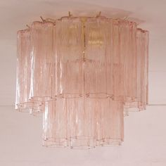 a pink chandelier hanging from the ceiling