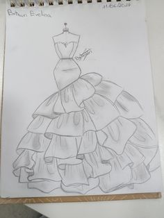 a drawing of a dress with ruffles on it