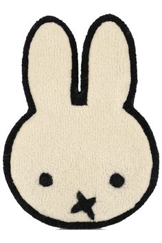 a black and white bunny face patch on a white background