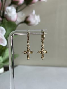 18K Gold-Plated Cross Earrings These Delicate Gold Cross Earrings are sure to make you look expensive. Made entirely of 18K Gold Plated material these earrings are comfortable, light, and hypoallergenic. Safe to wear for those with sensitive ears. Nickel-free. Style: Romantic Gold Cross Earrings, Look Expensive, Free Style, Cross Earrings, Gold Cross, Sensitive Ears, Gold Gold, Jewelry Earrings Dangle, 18k Gold