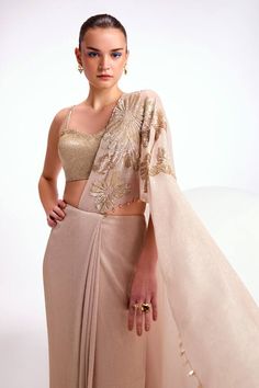 Champagne creamish pre-draped saree sequin floral pattern hand embellished palla with crystal border. Comes with sequin embellished blouse. - Aza Fashions Glamorous Pre-draped Saree With Cape Sleeves For Reception, Wedding Blouse With Cape Sleeves In Georgette, Wedding Saree With Cape Sleeves In Georgette, Silk Wedding Blouse With Draped Sleeves, Elegant Blouse With Draped Sleeves For Reception, Elegant Fitted Pre-draped Saree With Cape Sleeves, Glamorous Silk Wedding Blouse, Georgette Pre-draped Saree For Wedding, Silk Saree With Cape Sleeves For Wedding