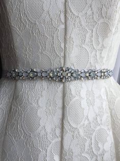 Ivory Crystal and Opal Jewel Embellished Ribbon Bridal | Etsy Elegant White Sashes With Rhinestones, Elegant Embellished White Bridal Belt, White Rhinestone Bridal Belt For Evening, Evening White Bridal Belt With Rhinestones, White Embellished Fitted Sash, Elegant Blue Bridal Belt For Wedding, Elegant Blue Sashes For Wedding, White Embroidered Bridal Belt For Formal Occasion, Elegant White Sash For Mother Of The Bride