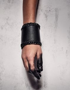 Black Leather Bracelet Cuff, Avant Garde Steampunk Bracelet, Extravagant Leather Bracelet with Chain, Black Leather Cuff | PLIK CLASSIC BRACELET CUFF with chain edge DESIGN This extravagant and stylish bracelet cuff has a perfect edge of a smoky chain knitted by hand, which envelops the whole cuff and gives him a mystical glare. Created with attention to each detail, this piece of designer work is perfect for any contemporary wardrobe. This little treasure is so universal and easy chic, that you Fringe Bracelet, Leather Wrist Cuff, Steampunk Bracelet, Avant Garde Jewelry, Suede Bracelet, Modern Bracelets, Black Leather Bracelet, Classic Bracelets, Wide Bracelet