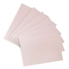 six pink napkins are stacked on top of each other