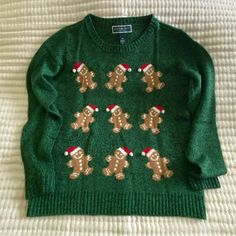 Green (Marled Green+Black) Holiday Sweater. Gingerbread Design (3x3 Stacked Gingerbread) With Raised White Cloth Ball Accent On Each Gingerbread Hat. Soft Knitted Material. Refer To Photos For Additional Details. Nwot Condition Laundered Once But Never Worn. No Notable Pilling Or Flaws To The Knitting Itself, But Some Of The White Ball Accents Have Slight Green Lint On Them Due To How The Item Was Folded. Stored Folded In Plastic Bin With Other Clothing Items. Household Closet Item, From Smoke Free / Pet Free Home. Leave A Comment If Any Questions. Offers Welcome. Crochet Christmas Sweater, Gingerbread Hat, Gingerbread Sweater, Forest Green Sweater, Gingerbread Design, Plastic Bin, Cute Christmas Sweater, Vintage Christmas Sweaters, Christmas Clothes