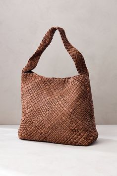 The Reina medium handwoven leather bag is a head-turner ready for work, travel, or everyday activities. Its tactile exterior makes this bag one that will stand out in your wardrobe, and its roomy interior and multiple secure pockets allow you to carry everything you might need right at your fingertips. Everyday Activities, Italian Leather, Cowhide Leather, Leather Shoulder Bag, Leather Bag, Hand Weaving, Shoulder Bag, Leather