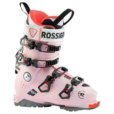 a pair of pink ski boots with white and red accents