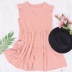 The EMES SHOP dress is detailed with gorgeous ruffle sleeves. Features a v neck line. shift dress silhouette. tiers. and an above knee length. Pair it with a hat and espadrilles for a refreshing summer look.MATERIAL:100% Soft Cotton MEASUREMENTS:Dress Length is 35-37"in Small | Bust & Waist: 37"-39"in Medium | Bust& Waist: 39"-41"in Large | Bust& Waist: 41"-43in V-neck Tiered Dress With Ruffle Hem For Day Out, Summer Cotton Tiered Dress For Vacation, Cotton Tiered Summer Dress For Vacation, Cotton Tiered Summer Beach Dress, Summer Tiered Cotton Dress For Vacation, Summer Tiered Dress With Ruffle Hem And V-neck, Vacation Tiered Dress With Ruffle Hem And Flutter Sleeves, Casual V-neck Tiered Dress For Beach, Chic Tiered Ruffle Sleeve Dress For Spring