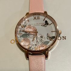 Enjoy Beautiful Olivia Burton Ob16wg40 Signiture Florals Watch With 38mm Lighter Mint Green Tone Face With Multicolor Floral Pattern & Butterflies On Its Face & Rosegold Bezel And Rosegold Roman Numerals Hour Markers And Pink Tone Leather Band. Its Original Retail Price Is $125 & Overheads. Enjoy This Gorgeous Watch At Great Price. Tone Face, Light Mint Green, Green Tone, Olivia Burton, Green Tones, Pink Tone, Roman Numerals, Leather Band, Accessories Watches