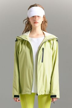 A versatile utility jacket in an oversized cut for easy layering over any tops. Oversized Solid Outerwear With Pockets, Green Oversized Windbreaker For Spring, Oversized Green Windbreaker For Spring, Spring Techwear Long Sleeve Utility Jacket, Spring Techwear Outerwear With Pockets, Oversized Spring Parka, Versatile Winter Outdoor Windbreaker, Versatile Long Sleeve Windbreaker For Winter, Oversized Long Sleeve Spring Parka