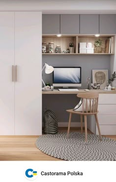 a room with a chair, desk and computer on it