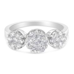 three stone diamond ring in white gold with diamonds on the sides and two stones at the top