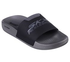 Post-pickleball recovery gets the spotlight with specialized comfort and style in Skechers Hyper Slide - Revive Pickleball. This athletic slide sandal features a synthetic leather upper with a HYPER BURST cushioned midsole and an anti-slip Goodyear performance outsole. | Skechers Men's Hyper Slide - Revive Sandals | Medium Width | HYPER BURST cushioning midsole offers a highly responsive and ultra-lightweight experience. This innovative resilient foam is created using a 'Super Critical' process Sporty Slip-on Slides For Outdoor Activities, Slip-resistant Slide Sport Sandals For Outdoor Activities, Comfortable Slip-resistant Sports Slides, Sporty Slip-resistant Sandals For Water Sports, Functional Slip-resistant Synthetic Sandals, Sporty Slip-resistant Slip-on Flip Flops, Functional Synthetic Slip-on Slides, Non-slip Synthetic Sport Sandals For Water Sports, Slip-resistant Synthetic Slide Sport Sandals