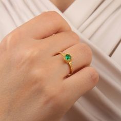 ➤ Ring Details * 14K / 18K Yellow Gold or Yellow Sterling Silver * Gold Color Options; 14K / 18K White, Yellow, Rose Gold * Sterling Silver Color Options; Yellow, Rose, White * Band Width: 1.50mm * Thickness: 1.70 mm ➤ Gem Details * Gemstone 1 : Emerald * Gem width: 4 millimeter * Gem length: 4 millimeter * Cut Type: Round * Ready to Ship 3-5 Business Days 💍 ISEA Jewels' pieces are handcrafted by 10-15 years of experienced craftsmen and made to order in a very short time. 🎁 All pieces come in a quality and hygienic suede gift box enclosed in a pouch. 🌎 Our products arrive worldwide within 6 working days. ❓ Questions, comments, or just want to say hi? We are glad to hear from our customers and are always quick to respond. Reviews are always appreciated ✨ 💫 Find out more about my shop at Yellow Gold Open Signet Ring With Solitaire, Yellow Gold Solitaire Signet Ring, Yellow Gold Solitaire Signet Ring Open Ring, Yellow Gold Solitaire Signet Ring With Open Design, Yellow Gold Ring With Prong Setting For Proposal, Green 14k Gold Ring For Proposal, Yellow Gold Rings With Prong Setting For Proposal, Yellow Gold Octagon Rings For Gift, 14k Gold Octagon Signet Ring Gift