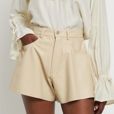 Nwot Weworewhat Faux Leather Shorts In The Shade Cream!! Super Cute Design, Has A Flare Bell Look By A Wide Leg Cut. Can Easily Be Dressed Up Or Down - Good For Any Occasion! Retails For $79 Composition & Fit Wide Leg Four Pocket Design 50% Polyurethan / 50% Polyester Faux Leather Shorts, Pleated Jacket, Leather Short, Bow Detail Dress, High Rise Denim Shorts, Faux Leather Belts, Tailored Design, High Rise Denim, Leather Shorts