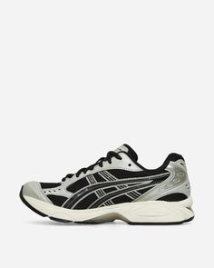 Asics GEL-Kayano 14 Sneakers Black / Seal Grey.As a nod to the storied Asics GEL-KAYANO™ series, the GEL-KAYANO™ 14 running shoe returns with a late-2000s aesthetic. The first iteration in the sneaker's lineage to be designed by someone other than Toshikazu Kayano, this version reinterprets the shoe's performance capabilities with updated materials and components. The original midsole tooling with GEL™ technology cushioning is mirrored here. The fit of the upper is also improved, while the layered leather and mesh construction from 2008 is retained..Synthetic Upper.Leather Overlays.GEL™ Technology Cushioning.Rubber Outsole.Style Code: 1201A019-005 Asics Running Shoes With Vented Sides For Streetwear, Asics Sporty Running Shoes With Vented Sides, Sporty Asics Running Shoes With Vented Sides, Asics Running Shoes With Vented Sides For Light Sports, Asics Running Shoes Medium Fit For Streetwear, Asics Running Shoes With Gel Cushioning For Streetwear, Asics Black Jogging Sneakers, Asics Black Sneakers For Jogging, Asics Black Sneakers For Light Sports