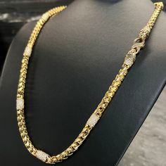 Discover the epitome of luxury with our UNRIVALED 10 carat diamond-paved, diamond-cut Franco chain, meticulously crafted with an upgraded diamond version of our Signature Lion & Snake Clasp. This 6mm men’s gold chain features nine pave’-diamond stations, pave’-diamond collars, and dazzling diamonds set in the lions’ eyes on the two lion head end caps. Stamped with the quality hallmark, this Franco chain guarantees exceptional craftsmanship and durability. Its diamond-cut design adds a captivatin Lions Eyes, Gold Necklace For Men, Lion Head, Gold Pendant Necklace, Cut Design, Diamond Cut, Men Necklace, Pave Diamonds, Gold Pendant