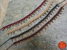 This bohemian anklet  is created knot by knot with the macrame technique adorned with brass beads and leaves and waxed threads. Perfect for that casual boho style you can wear every day. Simply select your favourite color and you will be on your way to making it all yours.   The anklet is adjustable in length and closes by making a knot. If you prefer a slide lock as the closures I make for the necklaces or the bracelets in my shop, I can add it for you! Just leave me a note in the note to selle Gold Macrame Choker For Festivals, Handmade Bohemian Gold Anklets, Adjustable Cord Anklet For Festival, Bohemian Adjustable Cord Festival Anklets, Handmade Gold Anklets For Festival, Bohemian Tiny Beads Anklets For Festival, Bohemian Festival Anklets With Tiny Beads, Anklet Macrame, Macrame Anklet