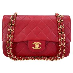 Store item: 68032 This Chanel 1988 Vintage Red Small Classic Double Flap Bag 24k GHW Lambskin is a very rare find as it's nearly impossible to find untouched red lambskin that's never been refurbished or redyed, and still in excellent condition. This is a vintage classic. Produced in 1988, almost 40 years old and in stunning condition. For 20 years, Boutique Patina has specialized in sourcing and curating the most pristine vintage and collectible accessories by searching closets around the world Classic Yellow Gold Rectangular Bag, Classic Rectangular Yellow Gold Bag, Red Formal Bags With Double Flap, Classic Yellow Gold Formal Bag, Classic Formal Yellow Gold Bag, Classic Yellow Gold Formal Bags, Structured Shoulder, Woven Chain, Classic Bags