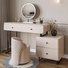 a dressing table with a mirror and stool