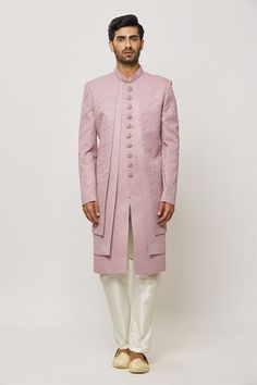 Lilac pink layered sherwani with thread work and statement buttons in art silk base. Paired with a cream aligadi pant. - Aza Fashions Pink Naqshi Kurta For Festivals, Festive Pink Kurta With Naqshi Details, Elegant Pink Bandhgala Straight Kurta, Festive Pink Designer Bandhgala, Pink Elegant Bandhgala Kurta, Elegant Pink Bandhgala Kurta, Pink Kurta With Zari Work For Formal Occasions, Designer Pink Kurta With Naqshi Details, Formal Pink Kurta With Zari Work