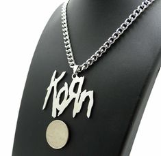 Metal Band Korn Pendant & 6mm 20" 24" 30" Cuban Chain Stainless Steel Necklace HIP HOP CELEBRITY STYLE BRAND NEW USA SELLER Product Description Stainless Steel Pendant & chain SIZE OF PENDANT : 2.0" X 2.15" Chain : 6mm 20" 24" 30" Cuban Chain High Quality and polished. Payments: US Customers: Paypal accepted International Customers: Paypal accepted Shipping: For Shipping & Handling within the US: FREE We do combine shipping! We ship via USPS (Post office) First Class Mail Tracking Info will automatically be posted via Paypal and ebay. Approximate Delivery Times: US: 2-5 BUSINESS DAYS Canada: 1-2 weeks Europe: 1-6 weeks South America: 2 weeks Australia: 2 weeks Asia: 2 weeks   We do everything possible with the packaging to ensure it arrives to you in perfect condition. If you have any ques Korn Band, Band Necklace, Stainless Steel Pendant, Cuban Chain, Steel Necklace, Metal Band, Stainless Steel Necklace, Fashion Jewelry Necklaces, Metal Bands