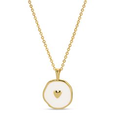 Stunningly crafted, this tiny heart pendant features an enamel background on a brass, plated 18" necklace. .5" Pendant, .75" Drop 18" Necklace 18k Gold Plated Brass Base Enamel Packaging: 'Quick-Display' Folded Hanging tag Heart-shaped Enamel Charms Necklaces, Heart-shaped Enamel Charms Necklace, White Heart Charm Round Pendant Necklace, White Heart Charm Necklace With Round Pendant, White Heart Necklace With Round Pendant, Enamel Pendant Charm Necklace With Adjustable Chain, Brass Charm Necklace With Heart Charm For Gifting, Brass Charm Necklace With Heart Charm As Gift, Brass Charm Necklace With Heart Charm For Gift