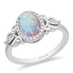 PRICES MAY VARY. Officially Licensed Disney Jewelry - Enchanted Disney Fine Jewelry Cinderella Ring in Sterling Silver with 8X6 MM Created Opal and 1/10 Cttw Natural White Round Diamond Dimension - L: 22.8 mm, W: 7.7 mm, H: 26.6 mm Inspiration – Create your own fairy tale with romantic jewelry inspired by Disney's Cinderella. Iconic jewelry designs of the pumpkin carriage and glass slipper in shining gold, sparkling diamonds, and beautiful blue topaz make you believe that dreams do come true Wor Cinderella Engagement Rings, Cinderella Ring, Enchanted Disney, Enchanted Jewelry, Enchanted Disney Fine Jewelry, Disney Fine Jewelry, Cinderella Wedding, Princess Jewelry, Opal Wedding Rings