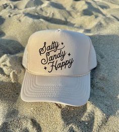 Salty Sandy Happy Women's Trucker Hat Trendy Trucker Hat Gifts for her Beach Trucker Hat River Hat Lake Life Hat Tan Trucker Hat ♥ Tan-Khaki OTTO Trucker Hat - One size fits most, Snapback mesh foam trucker hat ♥ Do not bleach or iron directly onto the design ♥ Wash on Cold - Inside out, preferable  ♥ Colors can vary from screen to screen - Please understand the actual color may vary slightly from your monitor or phone display  ♥ No refunds or exchanges since all orders are made once ordered but Casual Curved Brim Hat For Holidays, Casual Curved Brim Holiday Hat, Casual Curved Brim Hats For Holiday, Casual Holiday Hat With Curved Brim, Adjustable Casual Hats For Holiday, Cute Beige Hat For Vacation, Cute Beige Hats For Vacation, Cute Beige Beach Hats, Cute Curved Brim Hat For Outdoor