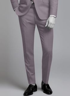 Make a voguish and exclusive update in your wardrobe with our Napolean Lavender Wool Suit that steals the spotlight off of everyone. Crafted with a wool blend, our suit exudes poise in such a way that helps you project your extraordinary personality. Its lavender color looks unique and makes you the most prominent person in the room. So be one of a kind by wearing our suit that promises nothing but admiration for you. 
 
 Look Includes  Napolean Lavender Wool Fabric  Two Button Jacket Style  Notch Lapel  Horn Royal Black Buttons  Single Vent  Three Cuff Buttons  Two Welted Back Pockets on Trousers   You can change the look during customization if required. 
 
 Lining: Viscose; Dry Clean. Elegant Lavender Blazer For Work, Elegant Purple Pants, Elegant Purple Suit With Suit Collar, Classic Tailored Purple Suits, Purple Notch Lapel Suit For Business, Tailored Purple Suit With Notch Lapel, Purple Tailored Suit With Notch Lapel, Tailored Purple Suit For Business, Tailored Purple Business Suit