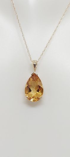 "CITRINE Drop 14k Yellow Gold Pendant / Necklace. Natural stone. 18\" gold Rope Chain necklace. Tear Drop Gemstone Jewelry. Yellow Citrine. November Birthday Stone. Product Info: - Stone: Tear Drop Yellow Citrine. - Color: Yellow. - Pendant Measures: 20mm x 8mm. - Stone Measures: 14x8mm - Stone Carat: 3.50 Ct - Metal: 14k Yellow Gold. - Chain Length: 18 inches Rope Chain. - Made in USA. - Nice Gift Box Included." Yellow Gem Necklace, Citrine Jewelry Necklace, Yellow Topaz Necklace, Yellow Stone Necklace, Yellow Jewelry Necklace, Yellow Topaz Jewelry, Yellow Gemstone Necklace, Ethereal Jewelry, Yellow Pendant