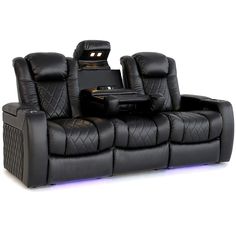 black leather reclining chairs with blue lights on the back and side tables in front